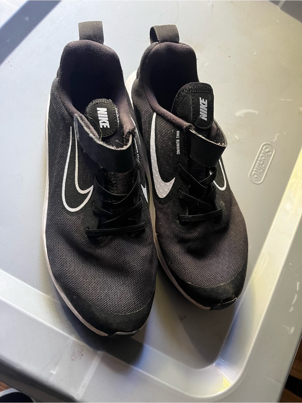 Nike Black Athletic Sneakers with White Swoosh